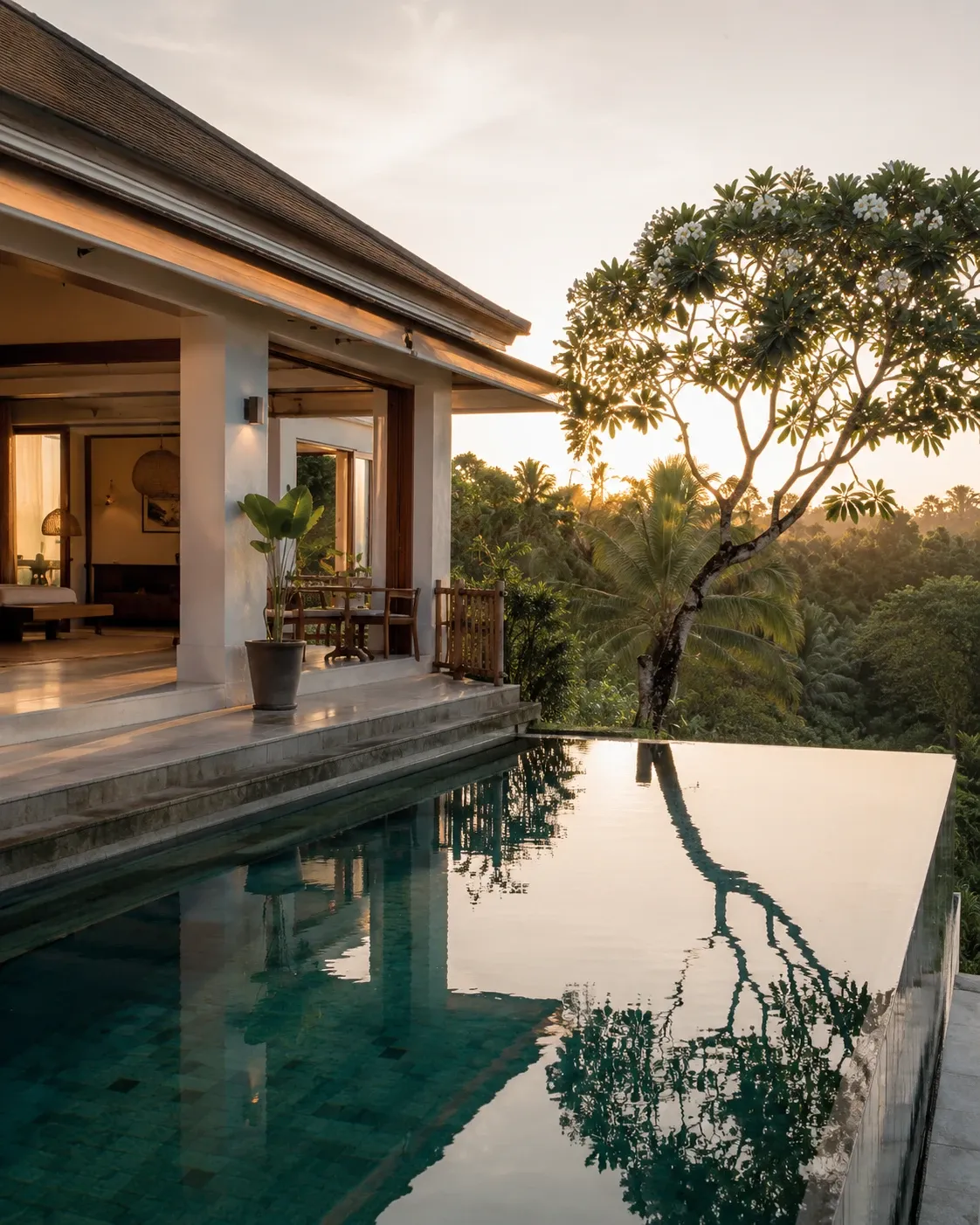 A villa with a private pool overlooking the valley at sunset
